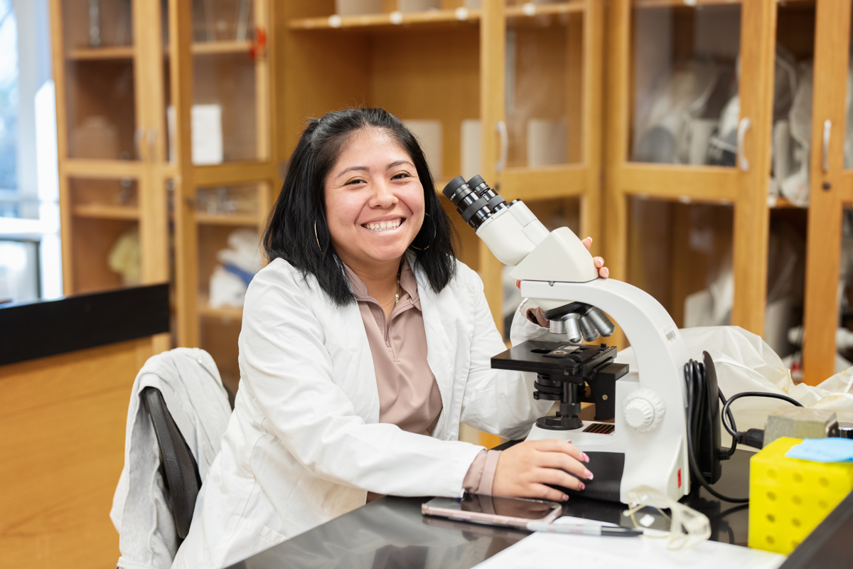 Student with microscope