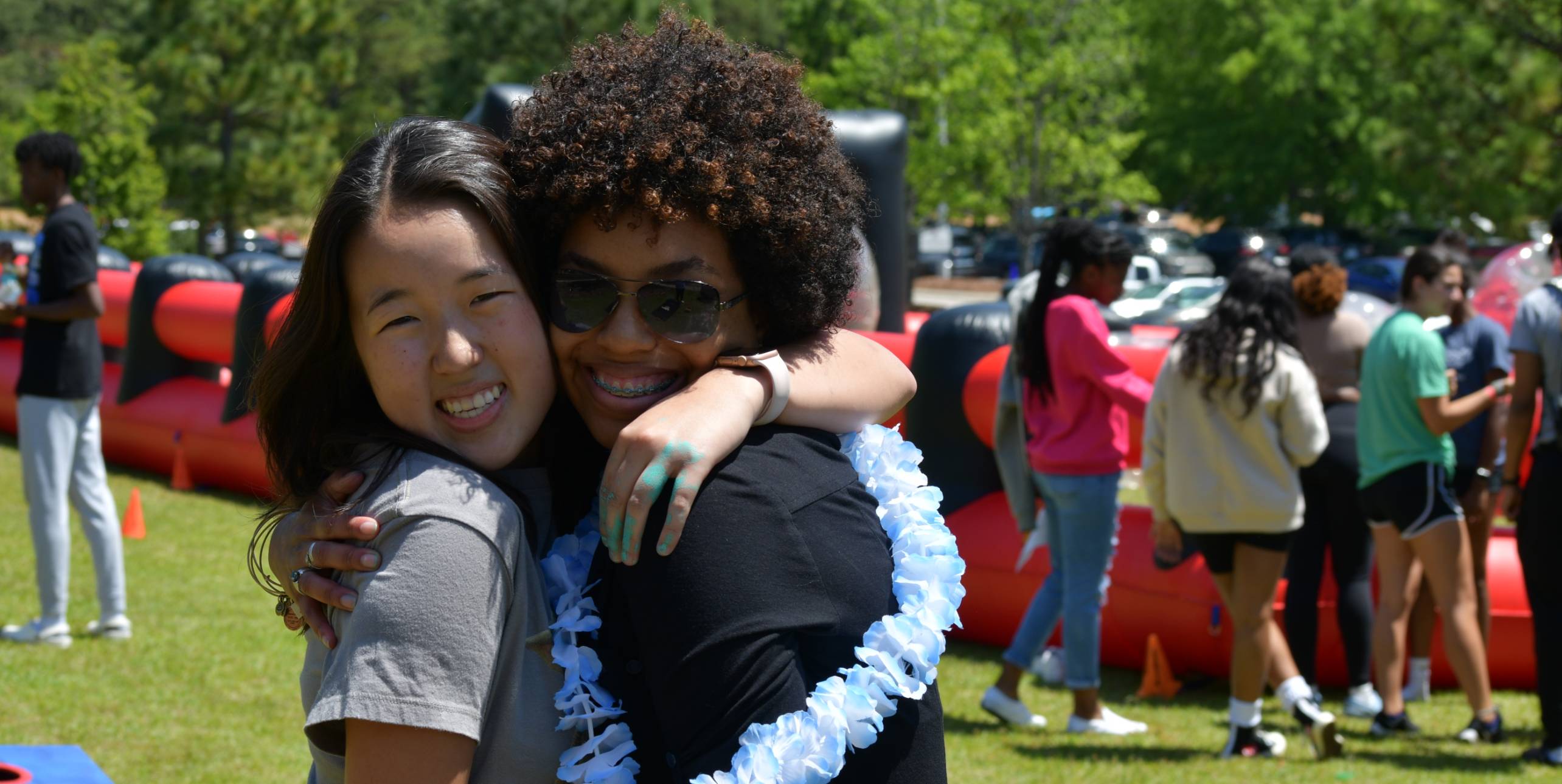 two students hugging