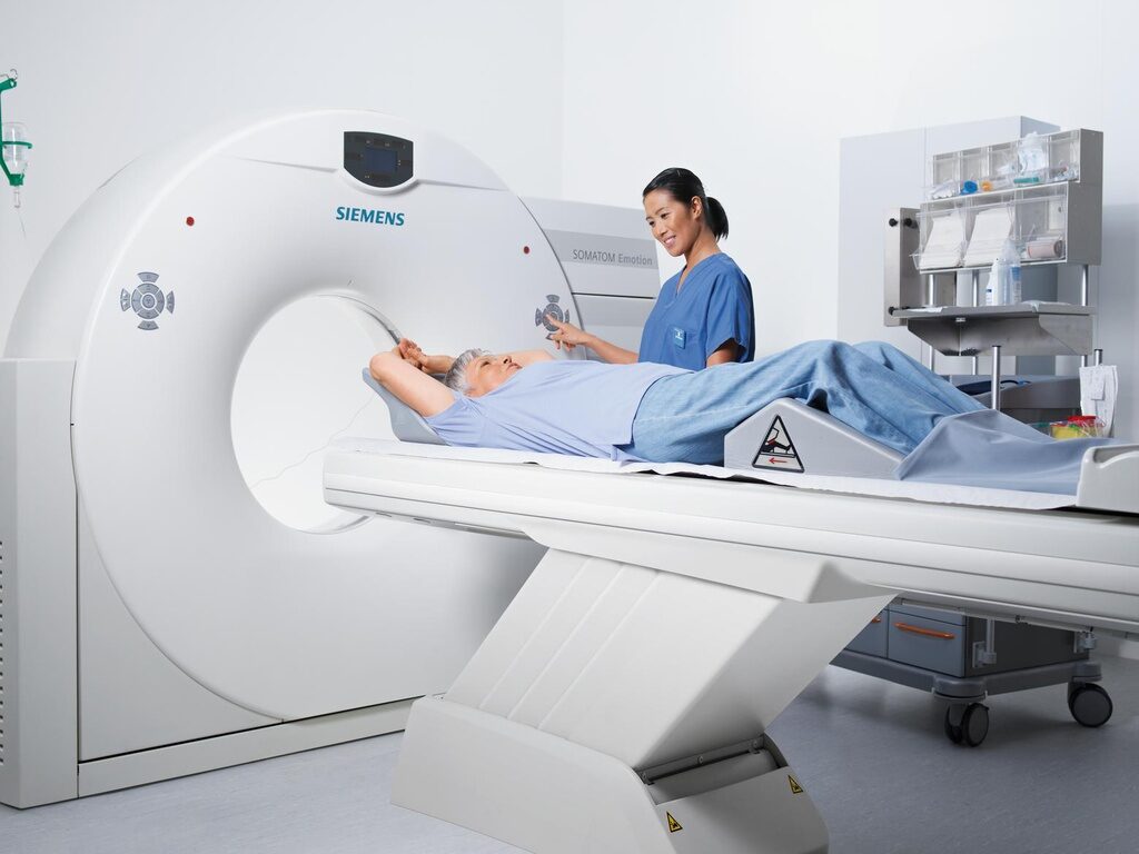 Patient entering CT machine