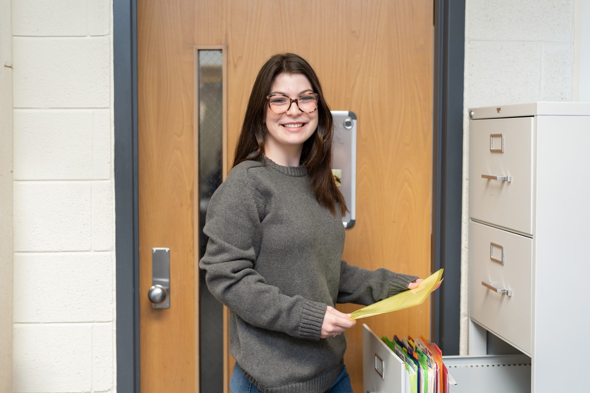 student with file