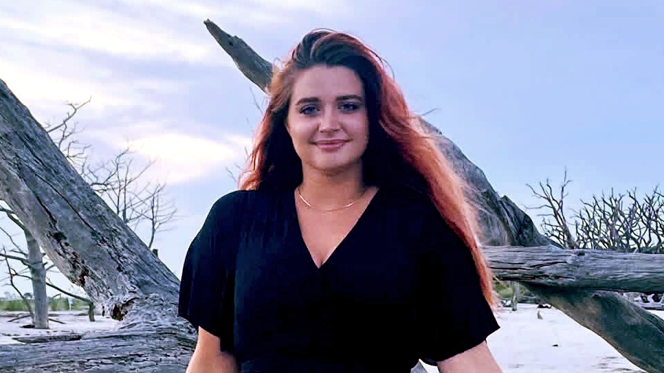 Emma Motta, a Culinary and Pastry Arts student at Sandhills Community College, standing outdoors.