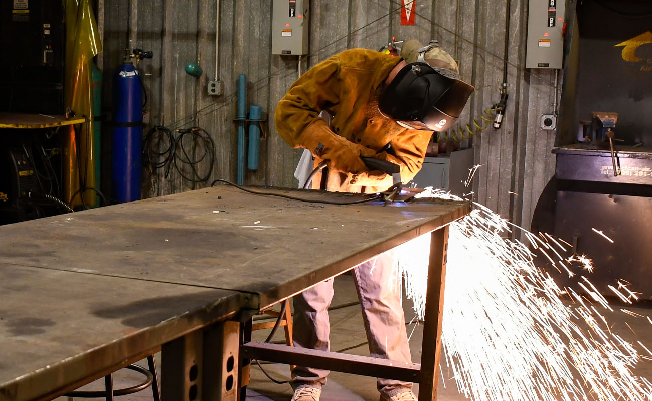 Welding student welding