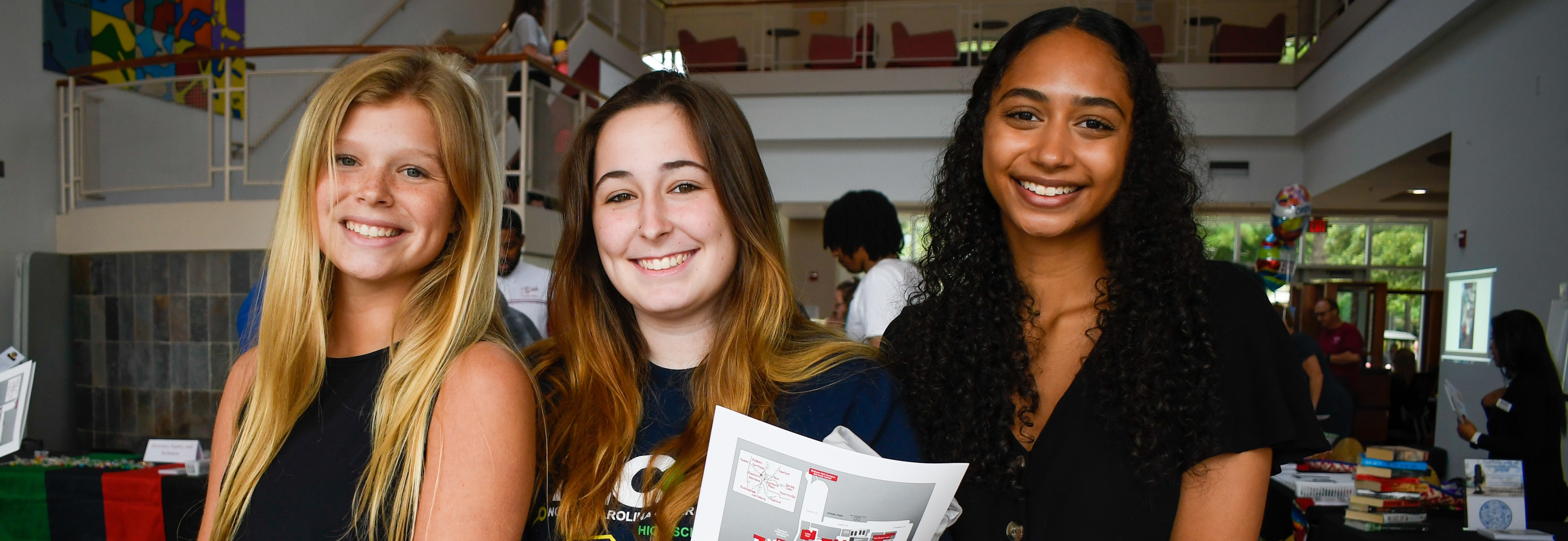 Three students in the student center