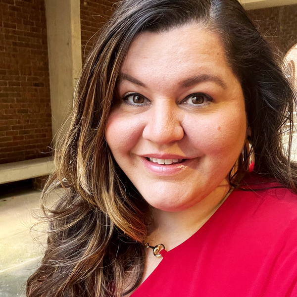 Emily Waldrop, Director of Access to Achievement at Sandhills Community College, smiling in an indoor setting.