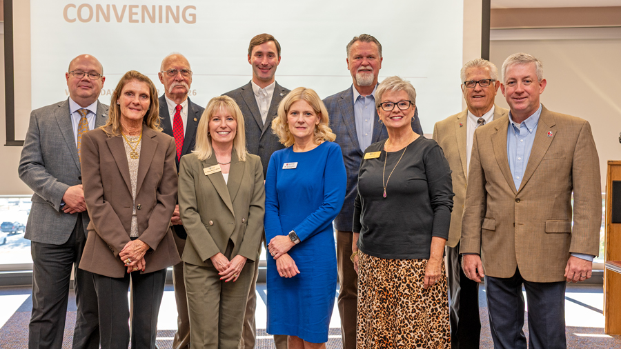 Ten community college leaders, including NC Community College System President Dr. Monty Sullivan and Sandhills President Dr. Sandy Stewart, pose for a group photo.