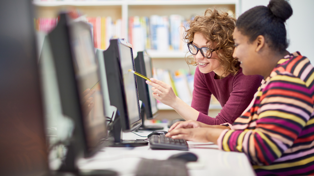 Pictured is someone learning how to use a computer