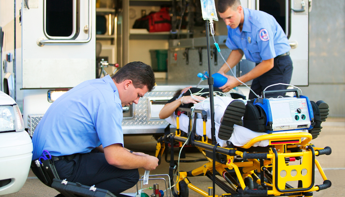 Pictured are EMTs working on a patient