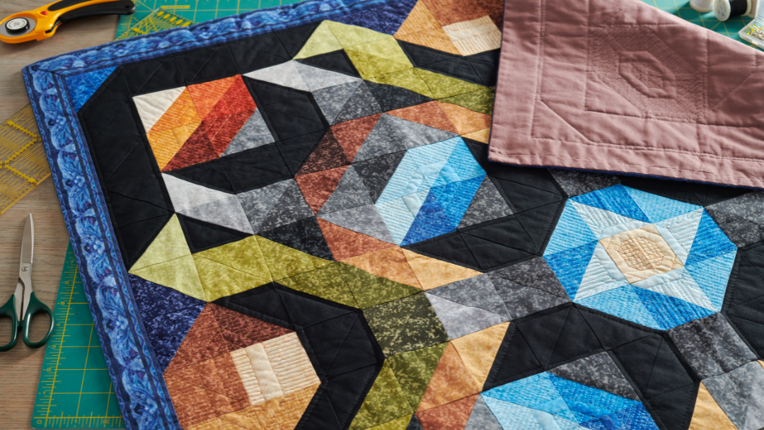Pictured is a quilt in the process of being made.