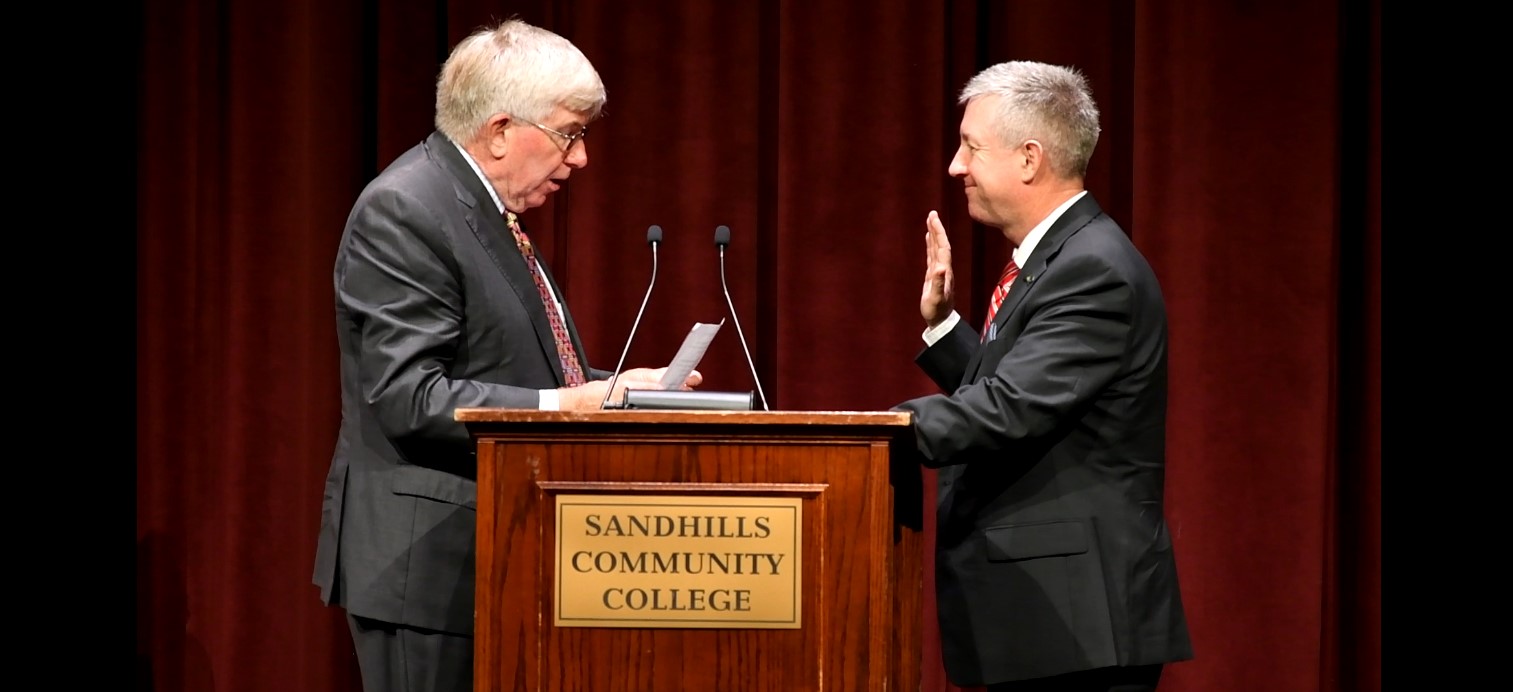 Dr. Sandy Stewart being sworn in as Sandhills new President