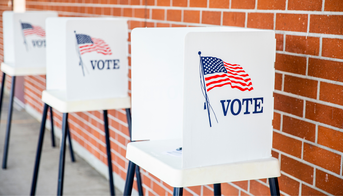 Pictured is a voting booth. 