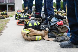 Close up of fire equipment at students' feet.