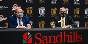 Dr. Dempsey and UNCP Chancellor Robin Gary Cummings sign a BraveStep agreement at SCC.